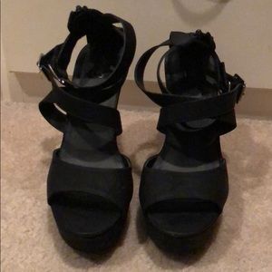 4” black strappy wedges.  Worn once